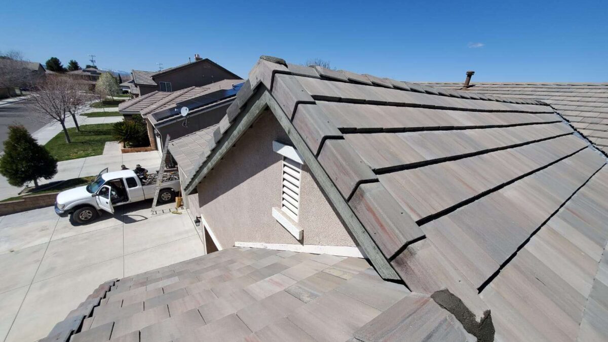 Tile roof removal and reinstallation with new underlayment by Coronado Roof Care in Santa Clarita, CA, License #1127354.