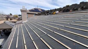 New TU-35 felt paper underlayment installed in Lancaster, CA—roof prepped for flat tile reinstallation to extend system life
