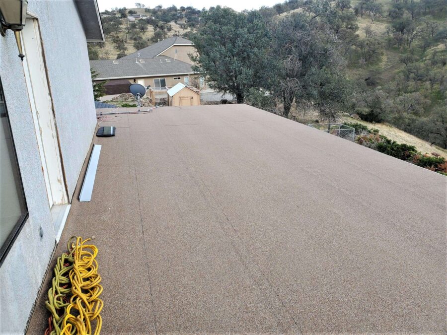 New second-layer modified bitumen installed on second-story balcony in Tehachapi—clean, sealed finish for lasting waterproof protection