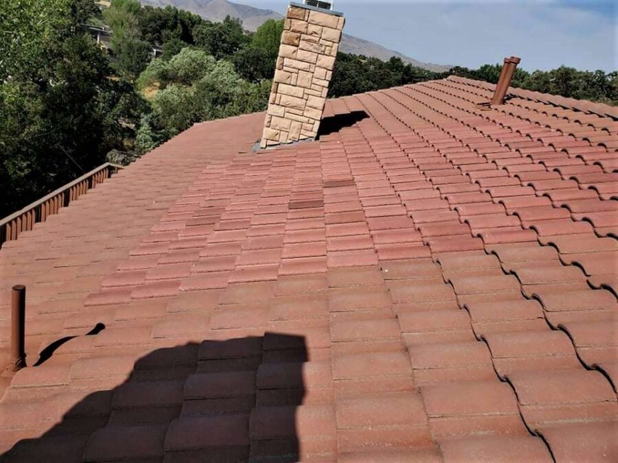 Partial terracotta tile roof installation and aesthetic tile swap in Tehachapi, CA—expert roof repair with regional style in mind