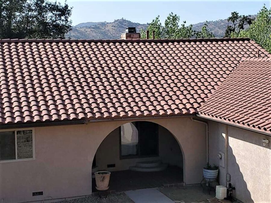 Partial terracotta tile roof installation and aesthetic tile swap in Tehachapi, CA—expert roof repair with regional style in mind