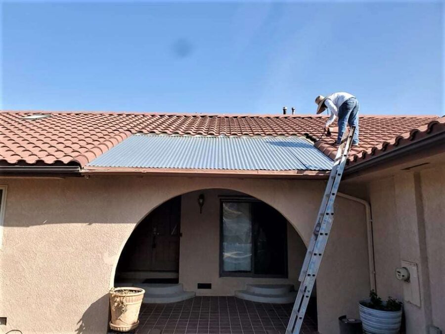 Partial terracotta tile roof installation and aesthetic tile swap in Tehachapi, CA—expert roof repair with regional style in mind