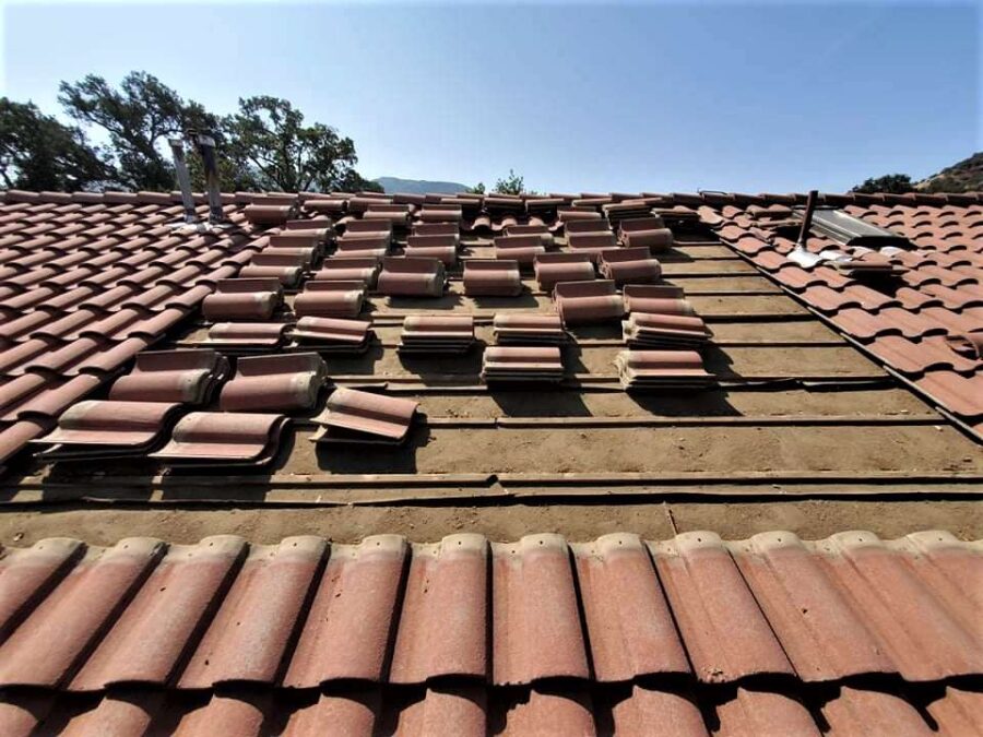 Partial terracotta tile roof installation and aesthetic tile swap in Tehachapi, CA—expert roof repair with regional style in mind