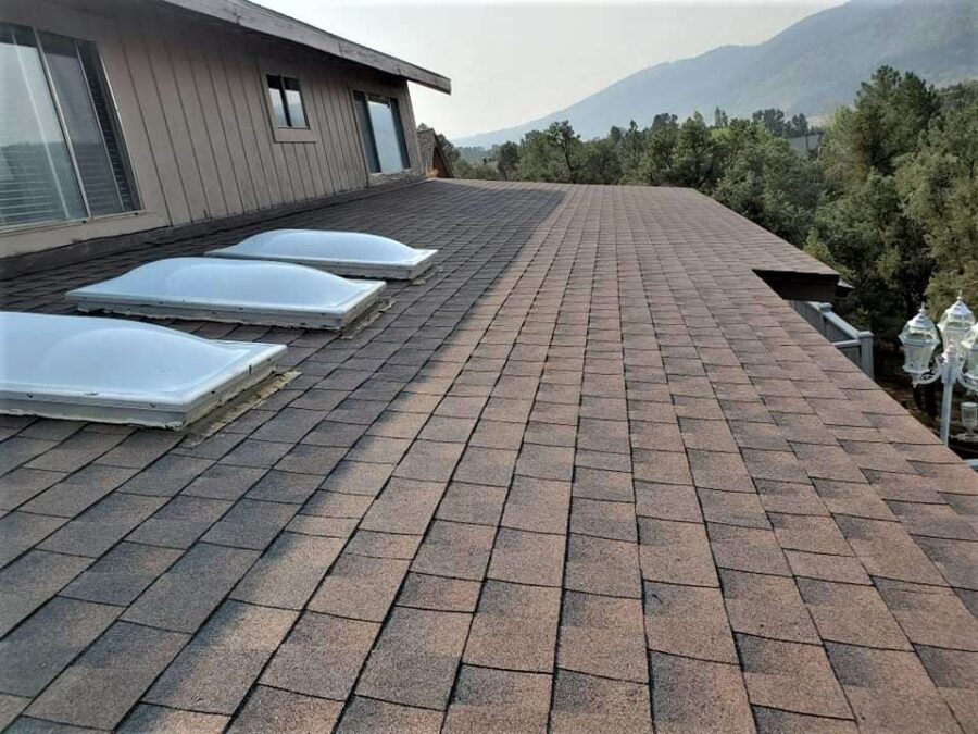 Reinstalled skylights set into completed Timberline Hickory shingle roof in Frazier Park, CA—clean finish and watertight seal