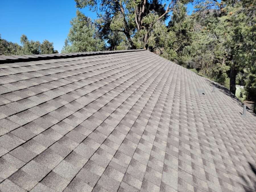 Completed GAF Timberline shingle roof with new flashings and GAF Cobra ridge vents installed in Pine Mountain Club, CA—roof replacement complete