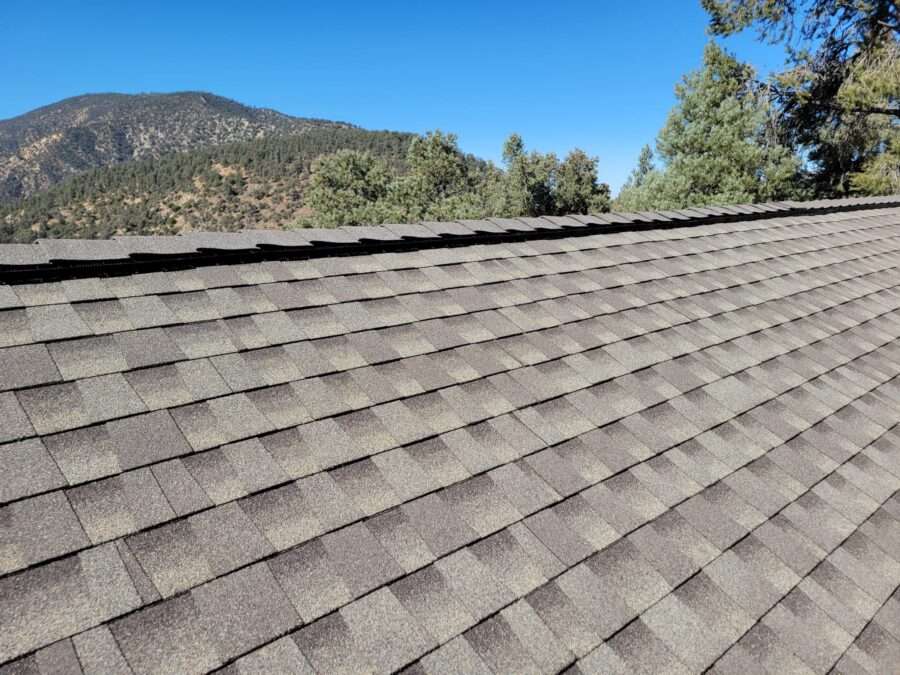 Completed GAF Timberline shingle roof with new flashings and GAF Cobra ridge vents installed in Pine Mountain Club, CA—roof replacement complete