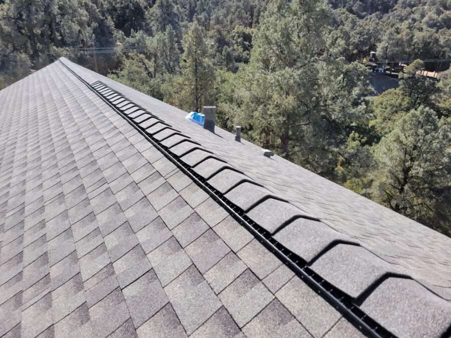 Completed GAF Timberline shingle roof with new flashings and GAF Cobra ridge vents installed in Pine Mountain Club, CA—roof replacement complete