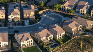 Aerial view of San Fernando Valley cul-de-sac with tile-roofed homes—highlighting maintenance needs for clustered residential roofs