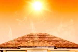 Hot summer sun shining over a tile roof home in Moorpark, California